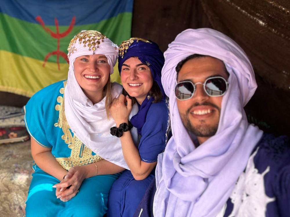 Hamid with guests in a nomad tent